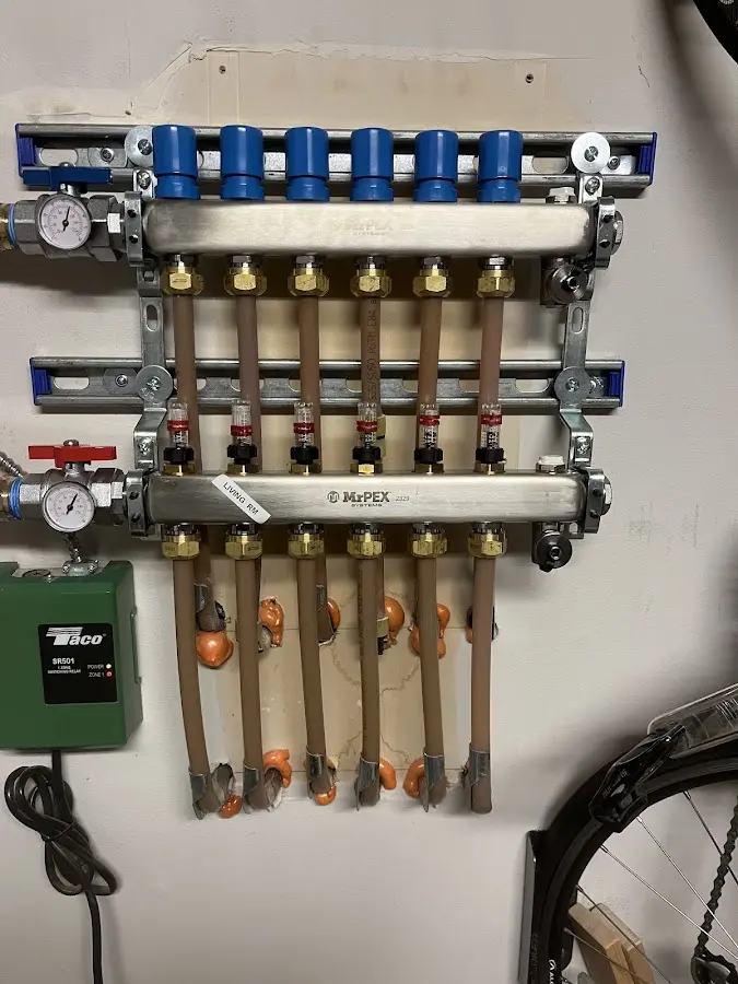 Plumber performing Water Heater Repair at a residential property in Winston-Salem